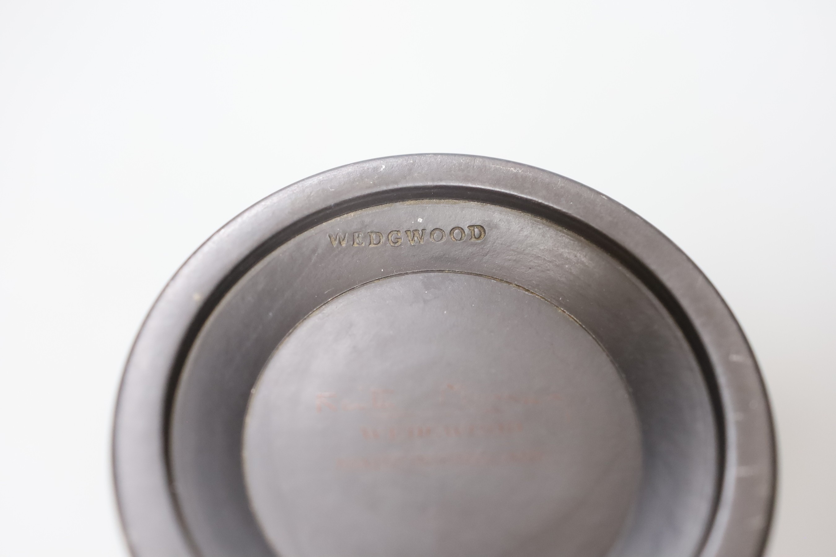 An unusual Keith Murray for Wedgwood vase - flared and ribbed black basalt, 20cm high